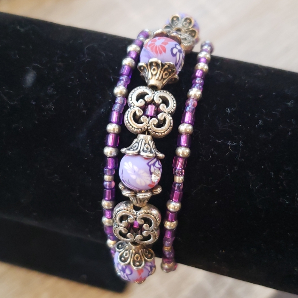 Tri-Strand Purple Bracelet Ftr. Clay Rhinestone